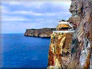 To sit drinking coffee on the terrace of the bar mid-afternoon or evening dancing in the discotheque of Xoroi with a track right in front of an opening of the cliff overlooking the empty vastness of the sea and the horizon is a privilege of a few, not to be missed